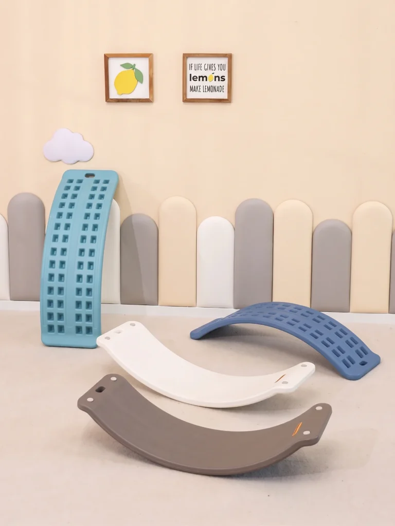 Multifunctional toddler wobble board for sensory integration training and active preschool play.