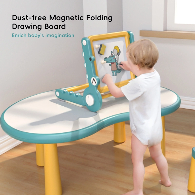 Toddler interacting with a dust-free magnetic writing pad on a tabletop, promoting safe and creative early childhood education.