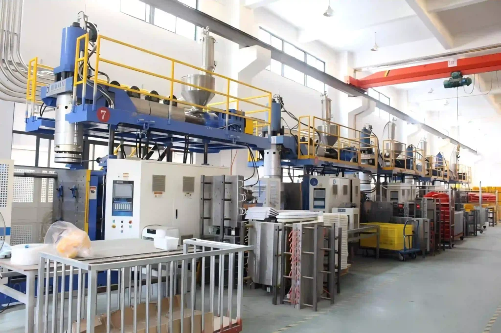 Blow molding production line in the Inhekids factory workshop.