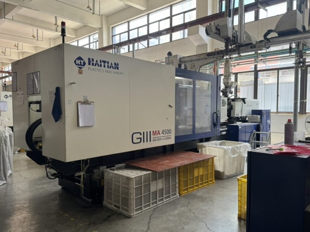 Haitian MA 4500 heavy duty 450 ton injection molding machine in Inhekids manufacturing workshop